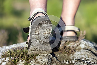 Coseup of sport shoes on trail walking in mountains, outdoors ac Stock Photo