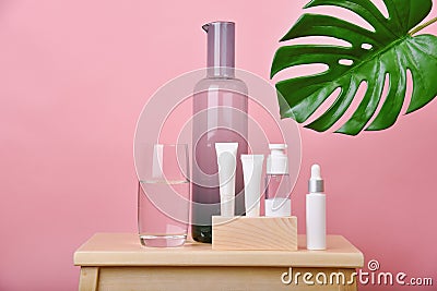 Cosmetic bottle containers and crystal clear glassware, Minimal natural hydration skincare concept Stock Photo