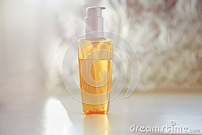 Cosmetic bottle mock up in trendy shadows close up. Beauty concept Stock Photo