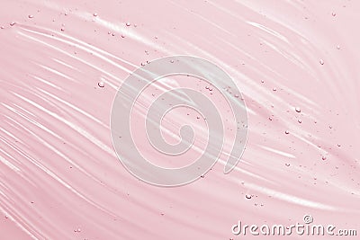 Cosmetic gel background. Face serum, clear beauty cream texture. Pink colored transparent skincare product close-up Stock Photo