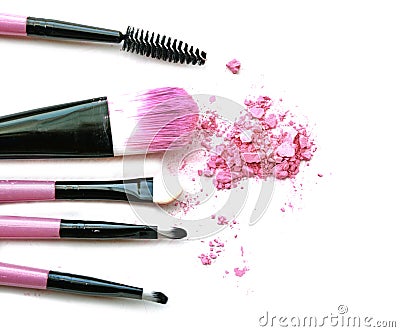 Cosmetic powder brush circle box and crushed blush palette isolated on white close up. Stock Photo