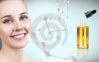 Cosmetic primer oil near woman face with big molecule chain. Stock Photo