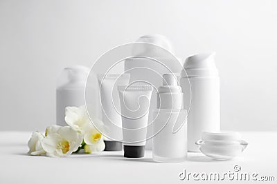 Cosmetic products on table Stock Photo