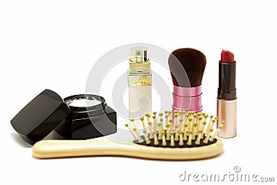 Cosmetic set with parfume blusher brush lipstic and comb Stock Photo