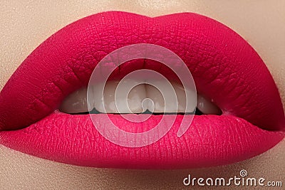 Cosmetics. Beautiful fashion bright pink lips mat make-up Stock Photo