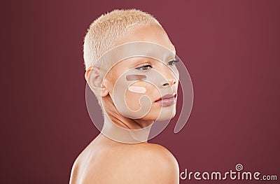 Cosmetics, foundation and face of woman with makeup products, beauty and contour on studio background. Salon aesthetic Stock Photo