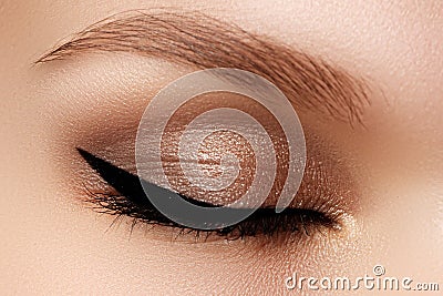 Cosmetics & make-up. Beautiful female eye with black liner Stock Photo