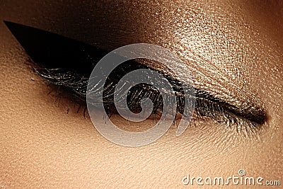 Cosmetics & make-up. Beautiful female eye with black liner Stock Photo