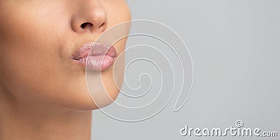 Cosmetics and makeup. Lips with pink gloss Stock Photo