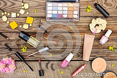 Cosmetics: mascara, beads, elastic hair band, false eyelashes, concealer, nail polish, perfume, eyeliner, powder, lip gloss, eye Stock Photo