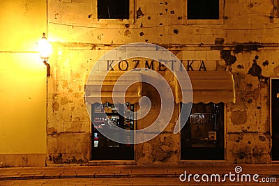 Cosmetics shop in downtown Makarska, Croatia at night during pandemic Editorial Stock Photo