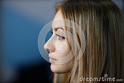 Cosmetologist applying drawing contour on lip before making lips microblading tattoo procedure Stock Photo