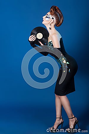 Cosmic woman with music album Stock Photo