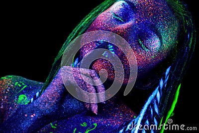 Cosmic woman, ultraviolet body art. Stock Photo