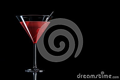 Cosmopolitan cocktail with cherry in martini glass Stock Photo