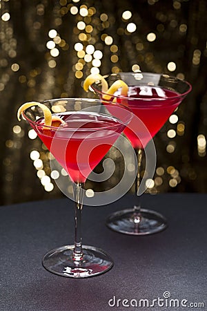 Cosmopolitan cocktail with lemon garnish Stock Photo