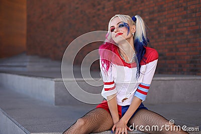 Cosplayer girl with in Harley Quinn costume Stock Photo