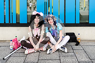 Cosplayers resting during Comic Con Germany in Stuttgart Editorial Stock Photo