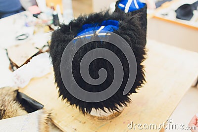 Cossack caps on the counter. Traditional Cossack clothes. Stock Photo