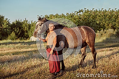 Cossack and his horse. Ukraine. Zaporozhye Sech. Stock Photo