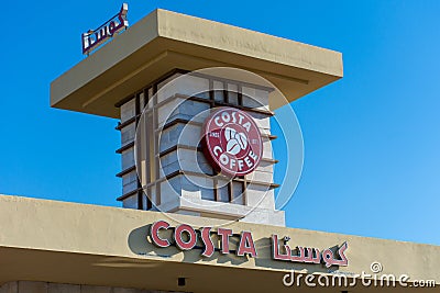 Costa Coffee Sign on Wind Tunnel in English and Arabic Editorial Stock Photo