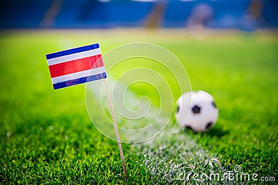 Costa Rica national Flag and football ball on green grass. Fans, support photo, edit space Stock Photo