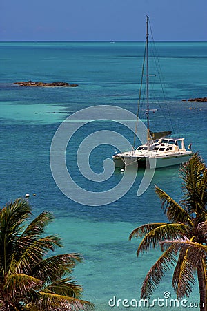 Costline boat catamaran in the blue lagoon relax isla contoy Stock Photo