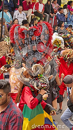 Dancers and spectators at the Diablada Editorial Stock Photo