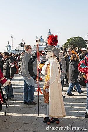 Carnival of Venice, the peculiar festival word-famous for its elaborate costumes and masks. Editorial Stock Photo