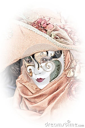 Costumed Reveler of the Carnival of Venice with a white vignette Stock Photo