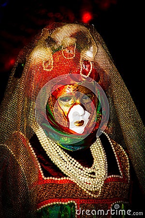 Costumed Reveler of the Carnival of Venice black with a white vignette Stock Photo