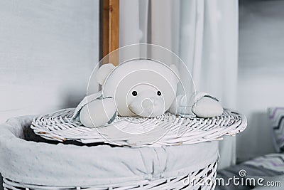Cosy childs room with many toys and grey wall Stock Photo