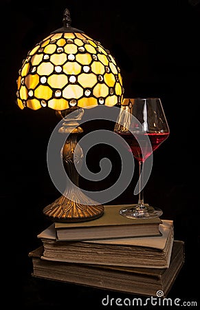 Cosy evening read with red wine Stock Photo