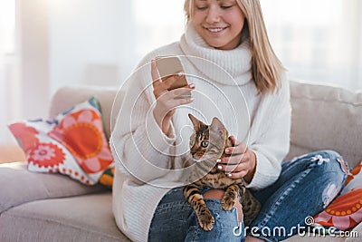 Cosy home family bengal cat girl petting Stock Photo
