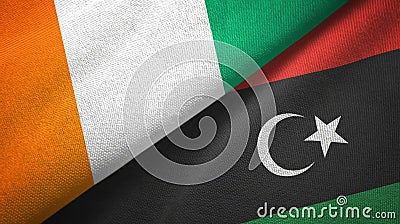 Cote d`Ivoire and Libya two flags textile cloth, fabric texture Stock Photo