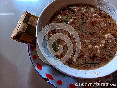 Coto Makassar is a typical food from the city of Makassar, Indonesia Stock Photo