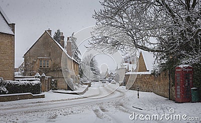 Cotswold village in snow, Gloucestershire, England Stock Photo