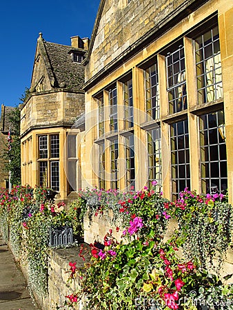 Cotswolds England Broadway village cottages with flower boxes Stock Photo