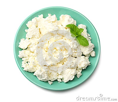 cottage cheese in blue bowl isolated on white background top view Stock Photo