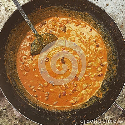 Cottage cheese curry being cooked in an Indian kitchen Stock Photo