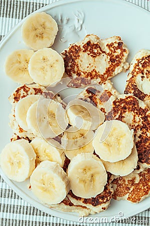 Cottage cheese pancakes with bananas Stock Photo