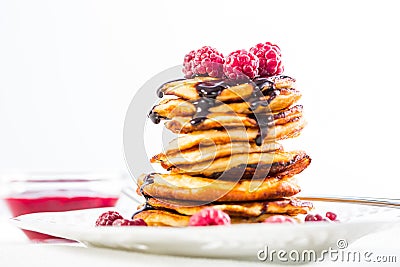 Cottage cheese pancakes with fresh raspberry and chocolate sirup Stock Photo