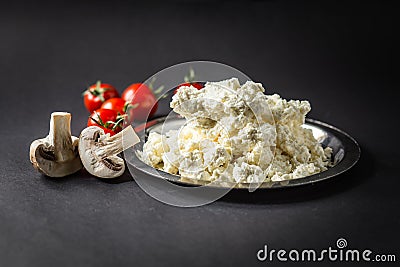 Cottage Cheese with Tomatoes and Mushrooms Stock Photo