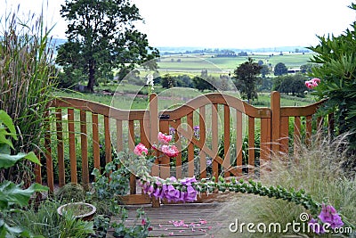 Cottage Garden looking onto fields Editorial Stock Photo