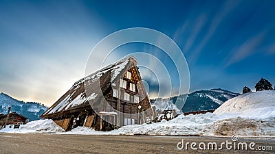 Cottage House Snow Mountain Background Stock Photo