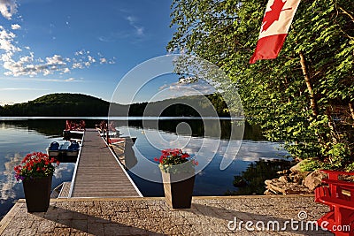 Cottage lakeside dock. Stock Photo