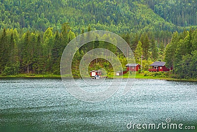 Cottage on shore of fjord in Norwegian style Stock Photo