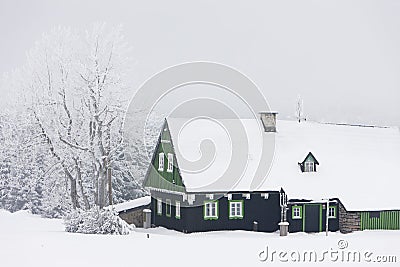 cottage in winter, Jizerske Mountains, Czech Republic Stock Photo
