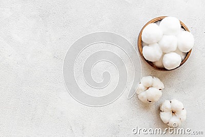 Cotton baby balls with cotton flowers, top view Stock Photo