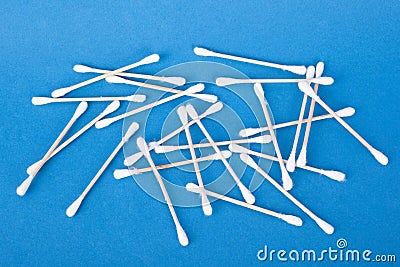 Cotton buds for cleaning auricles on blue background Stock Photo